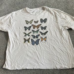 white graphic t shirt with butterfly's